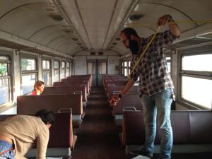 HAYP Team member Hovig Tashjian taking measurements in the train cart. Photo credits: Anna Gargarian