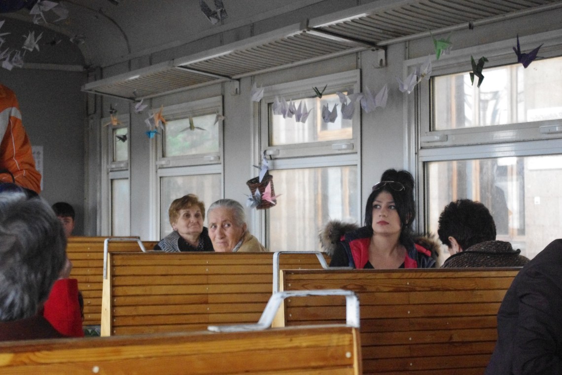 Passengers intrigued by the installation. Photo credit: Setrag Shahikian